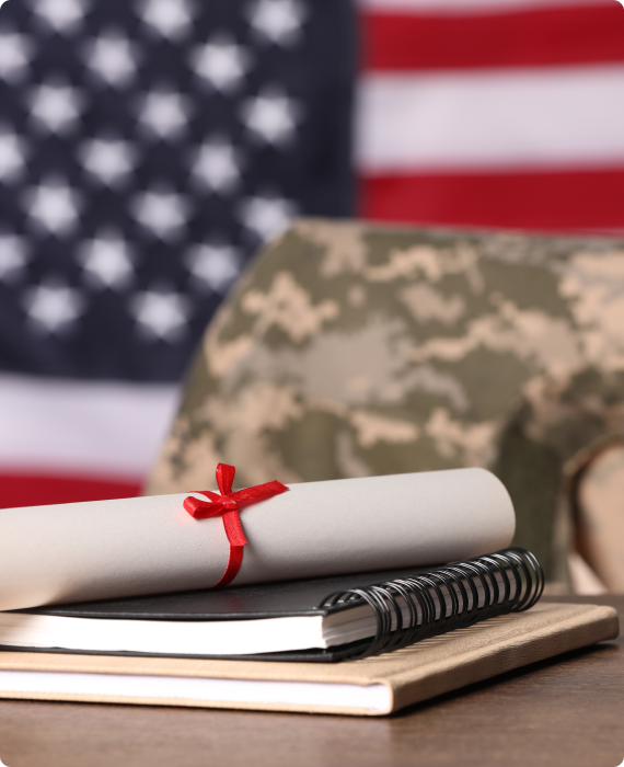 Military graduation diploma and notebooks.